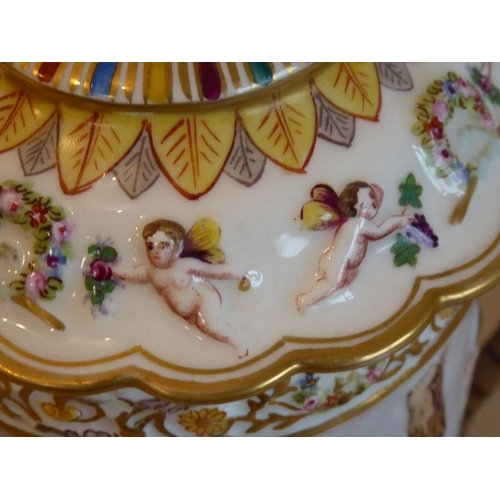 20 - A unusual and large 19th century Capodimonte porcelain tankard and cover; the cover finial as a wing... 