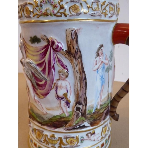 20 - A unusual and large 19th century Capodimonte porcelain tankard and cover; the cover finial as a wing... 