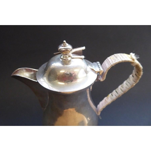 202 - A heavy hallmarked silver baluster-shaped hot-water jug with hinged lid, maker's mark 'S & Co', assa... 