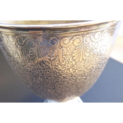 228 - A large 19th century ecclesiastical-style silver-plated chalice, the top border with a running guill... 