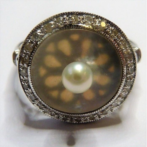 247 - An 18-carat white-gold, pearl, mother of pearl and diamond ring (The cost of UK postage via Royal Ma... 