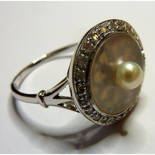 247 - An 18-carat white-gold, pearl, mother of pearl and diamond ring (The cost of UK postage via Royal Ma... 