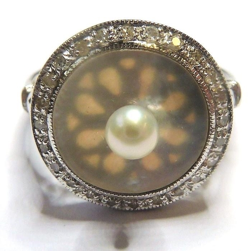 247 - An 18-carat white-gold, pearl, mother of pearl and diamond ring (The cost of UK postage via Royal Ma... 