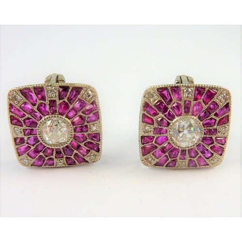 248 - A pair of ruby and diamond cluster earrings (The cost of UK postage via Royal Mail Special Delivery ... 