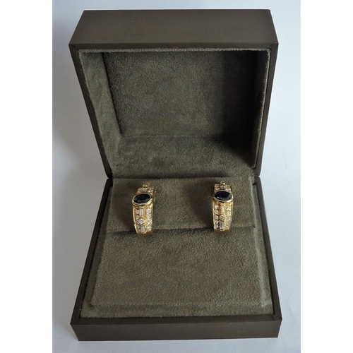 254 - A fine quality large pair of 18-carat gold, sapphire and diamond earrings (The cost of UK postage vi... 