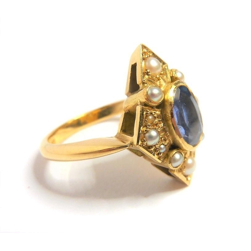 265 - A sapphire, half-pearl and 18 carat yellow gold dress ring of lozenge design, the central oval sapph... 