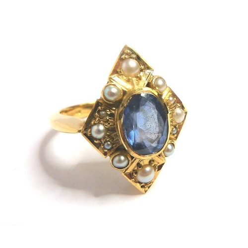 265 - A sapphire, half-pearl and 18 carat yellow gold dress ring of lozenge design, the central oval sapph... 