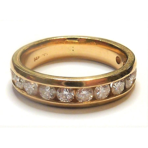 266 - A 14-carat gold half eternity ring set with twelve fine white diamonds; ring size  (The cost of UK p... 