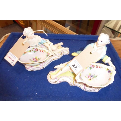 27 - A pair of 19th century hand-decorated continental porcelain bon-bon dishes modelled as recumbent fig... 