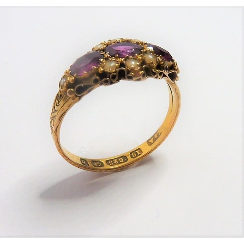 277 - A mid-Victorian 15-carat yellow-gold pink gemstone and half pearl ring; the three oval mixed cut sto... 