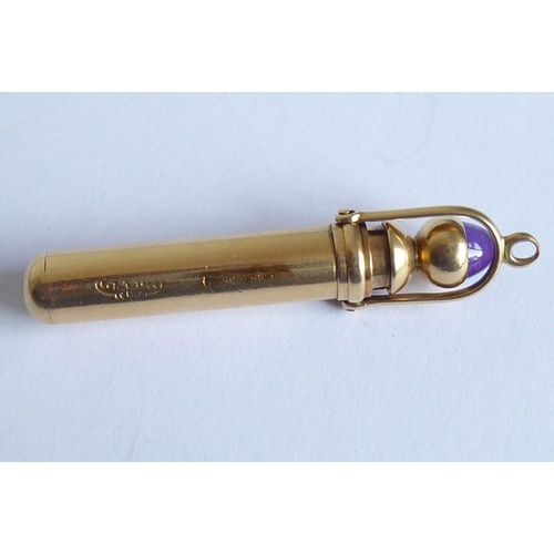 287 - A late 19th/early 20th century gold (marks rubbed) fob pencil; the handle finial mounted with a cabo... 