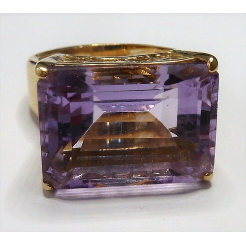 288 - A fine, large amethyst 9-carat gold dress ring; ring size Q (total weight approx.8.74g) (The cost of... 