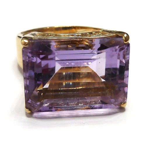 288 - A fine, large amethyst 9-carat gold dress ring; ring size Q (total weight approx.8.74g) (The cost of... 