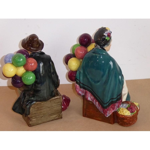 29 - Two Royal Doulton figures 'The Old Balloon Seller' (HN 1315), together with 'The Balloon Man' (HN 19... 