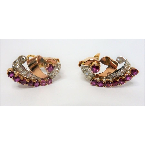 299 - A pair of gold, ruby and diamond earrings (The cost of UK postage via Royal Mail Special Delivery fo... 