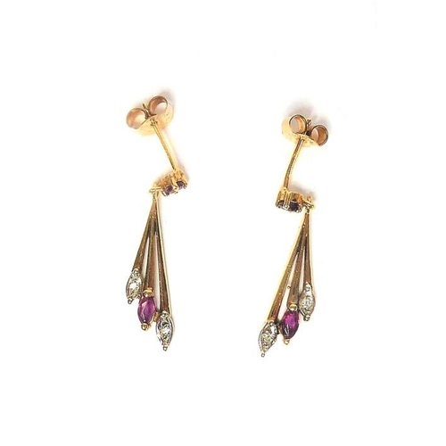 299 - A pair of gold, ruby and diamond earrings (The cost of UK postage via Royal Mail Special Delivery fo... 