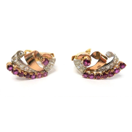 299 - A pair of gold, ruby and diamond earrings (The cost of UK postage via Royal Mail Special Delivery fo... 