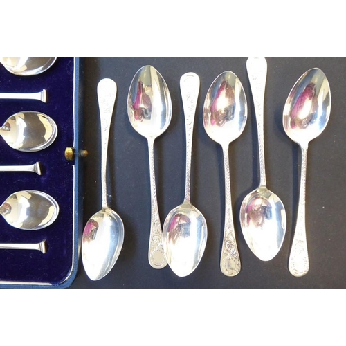 303 - A cased set of six hallmarked silver coffee spoons by Mappin & Webb Ltd together with a similar set ... 