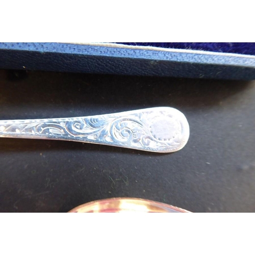 303 - A cased set of six hallmarked silver coffee spoons by Mappin & Webb Ltd together with a similar set ... 