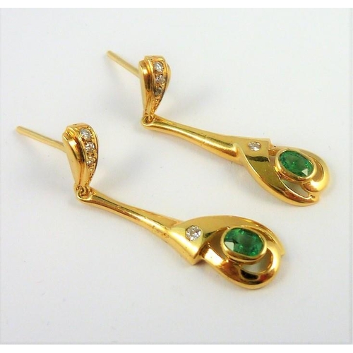 309 - A pair of gold, emerald and diamond earrings (The cost of UK postage via Royal Mail Special Delivery... 