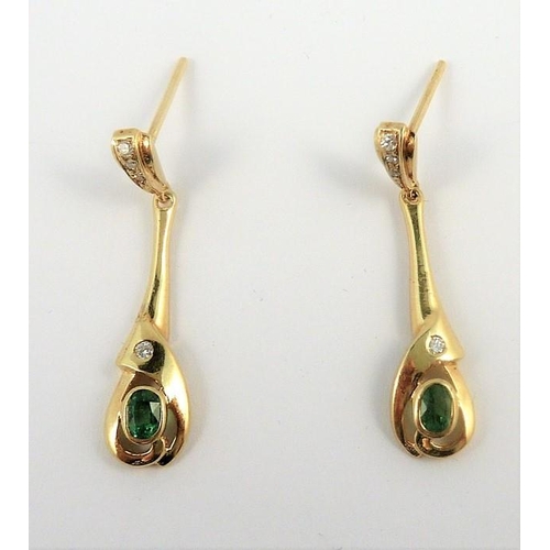 309 - A pair of gold, emerald and diamond earrings (The cost of UK postage via Royal Mail Special Delivery... 