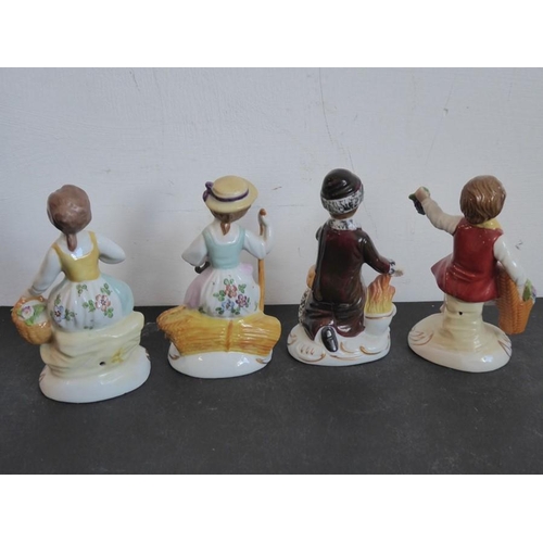 31 - A set of four late 19th/early 20th century hand-decorated continental porcelain figure models (all s... 