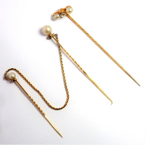 316 - A diamond-set and pearl (untested) stick pin, centrally set with an old brilliant-cut diamond with a... 