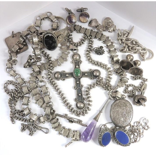 319 - A small collection of Victorian and later silver jewellery including a large Latin cross with applie... 