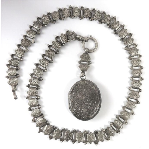 319 - A small collection of Victorian and later silver jewellery including a large Latin cross with applie... 