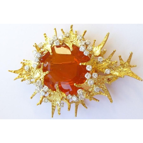 324 - A late 1960s/1970s fire opal and diamond brooch/pendant by George Weil, the central octagonal fire o... 