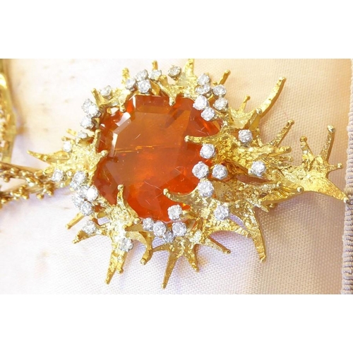 324 - A late 1960s/1970s fire opal and diamond brooch/pendant by George Weil, the central octagonal fire o... 