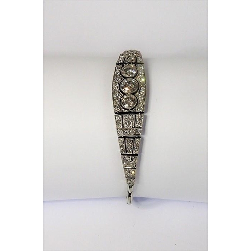 326 - A fine Art Deco platinum and diamond bracelet (The cost of UK postage via Royal Mail Special Deliver... 