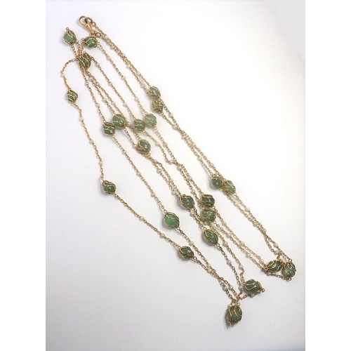 342 - An 18-carat yellow-gold, emerald bead and seed pearl long chain necklace, the trace link chain separ... 