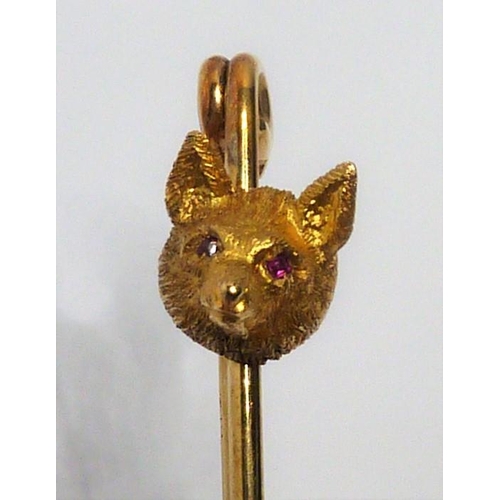 353 - Three yellow-gold bar brooches of hunting interest: one with a fox's head with ruby eyes (fitted cas... 