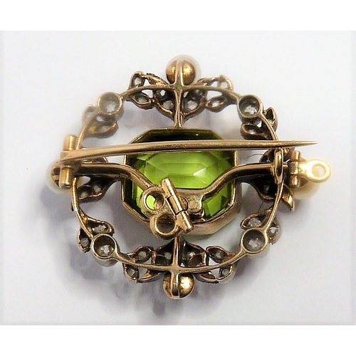 359 - An Edwardian peridot, pearl and diamond-set brooch/pendant, of shaped rectangular openwork design, c... 