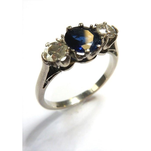 360 - A sapphire and diamond three-stone ring, the central circular mixed-cut sapphire with a brilliant-cu... 