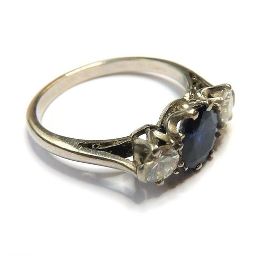 360 - A sapphire and diamond three-stone ring, the central circular mixed-cut sapphire with a brilliant-cu... 