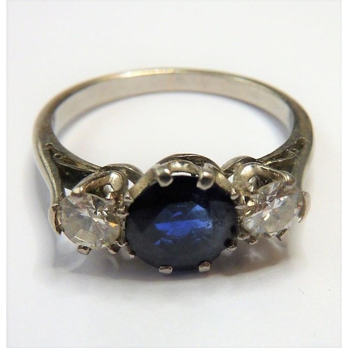 360 - A sapphire and diamond three-stone ring, the central circular mixed-cut sapphire with a brilliant-cu... 