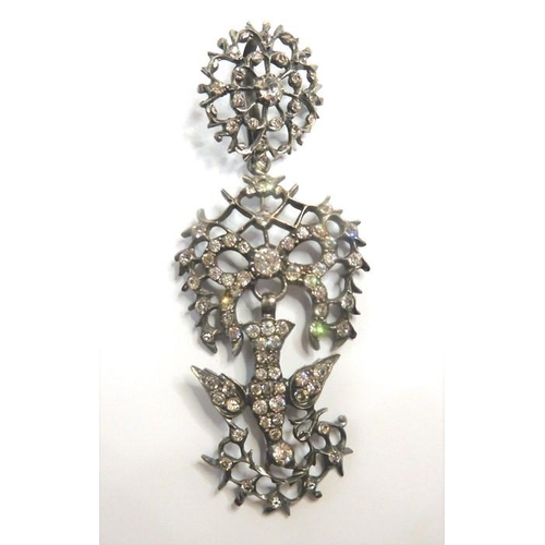 363 - A George III colourless paste openwork St Esprit pendant in three detachable sections, a silver swiz... 