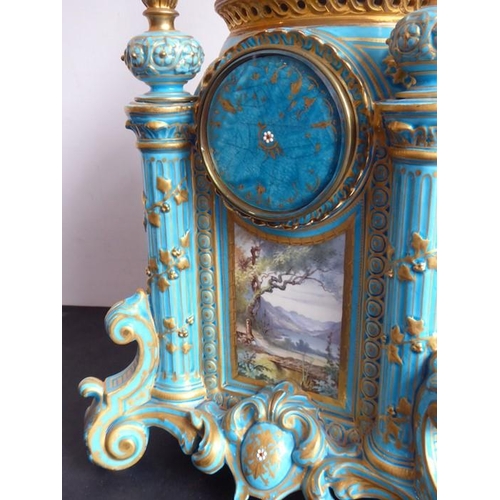 385 - A large 19th century Continental porcelain eight-day mantle clock of architectural form; the domed t... 