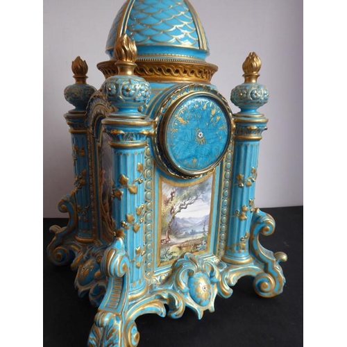 385 - A large 19th century Continental porcelain eight-day mantle clock of architectural form; the domed t... 