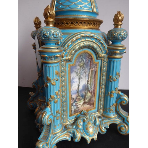 385 - A large 19th century Continental porcelain eight-day mantle clock of architectural form; the domed t... 