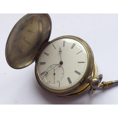 390 - A gentleman's late 19th/early 20th century full hunter pocket watch; the front case with engine turn... 