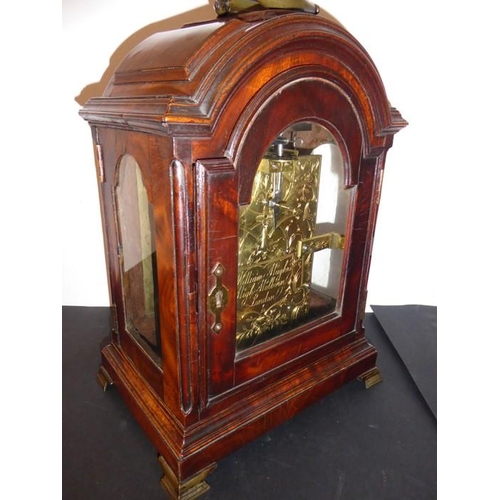 410 - A fine 18th century figured mahogany cased eight-day repeating bracket clock; the broken-arch dial h... 