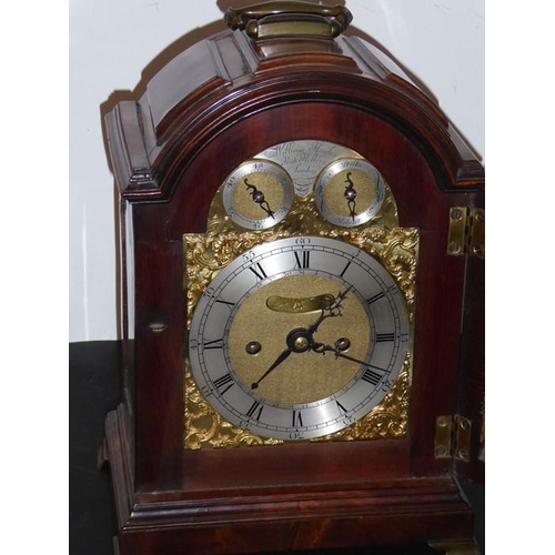 410 - A fine 18th century figured mahogany cased eight-day repeating bracket clock; the broken-arch dial h... 