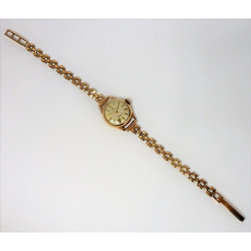 411 - A ladies 9-carat gold 'Cyma' bracelet watch (10.6g) (The cost of UK postage via Royal Mail Special D... 