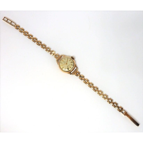 411 - A ladies 9-carat gold 'Cyma' bracelet watch (10.6g) (The cost of UK postage via Royal Mail Special D... 