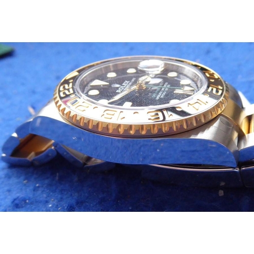 416 - A  gentleman's Rolex bi-metal GMT Master II Oyster Perpetual Date: originally purchased February 201... 