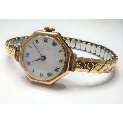 417 - A ladies octagonal shaped 9-carat gold wristwatch with white-enamel dial, in working order