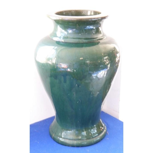 45 - An extremely large and heavy late 19th art pottery terracotta vase with dark-green glaze and in the ... 